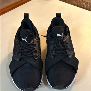 Puma women’s Black Sneakers size 8
